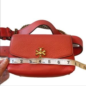 Tory Burch coral Kira belt bag 
One size it’s adjustable excellent condition